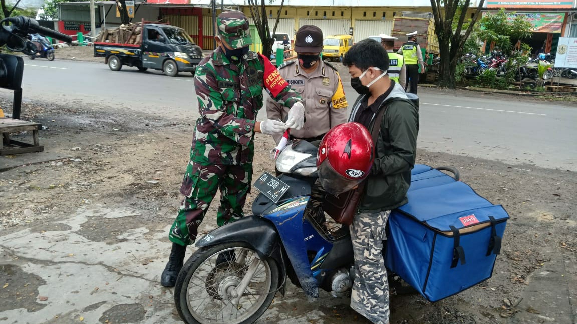Aparat Gabungan Razia Protokol Kesehatan 
