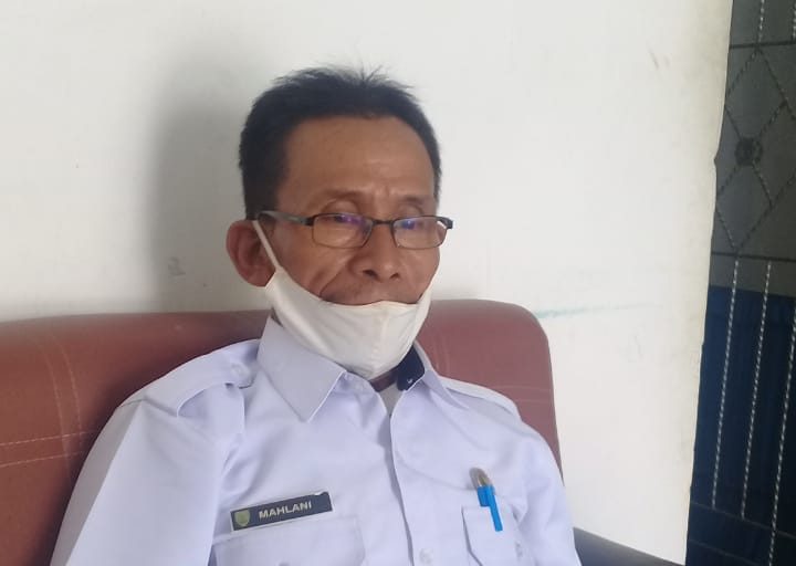 Pemerintah Desa Bagikan Masker Kepada Warga