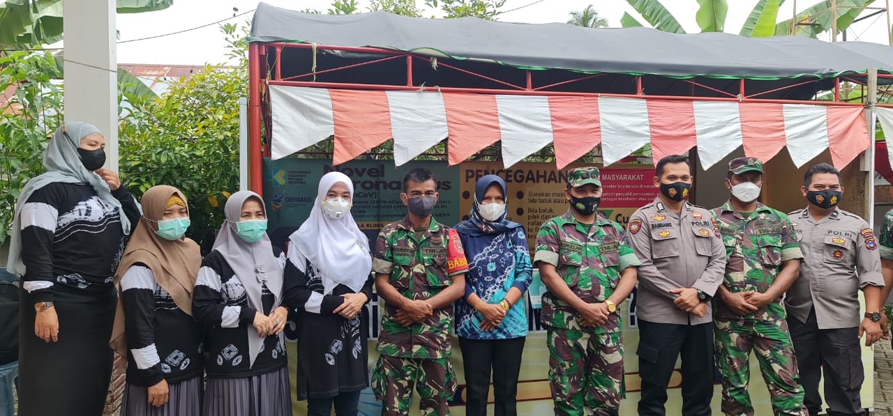 Tim Vaksinasi Puskesmas Barikin Berupaya Melawan Covid-19
