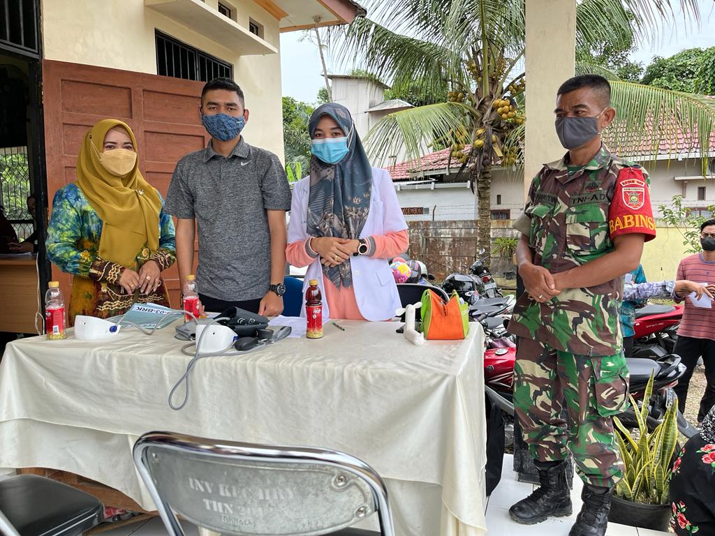 Hj Siti Hasnah Berharap Warga Haruyan 100% Divaksin